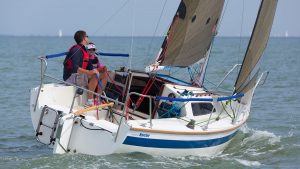 A man sailing a Copland Harrier 20