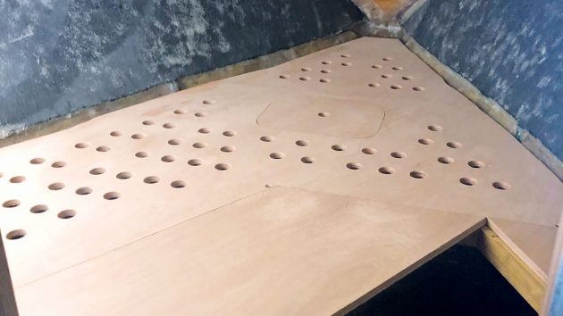 A double boat bunk made out of wood
