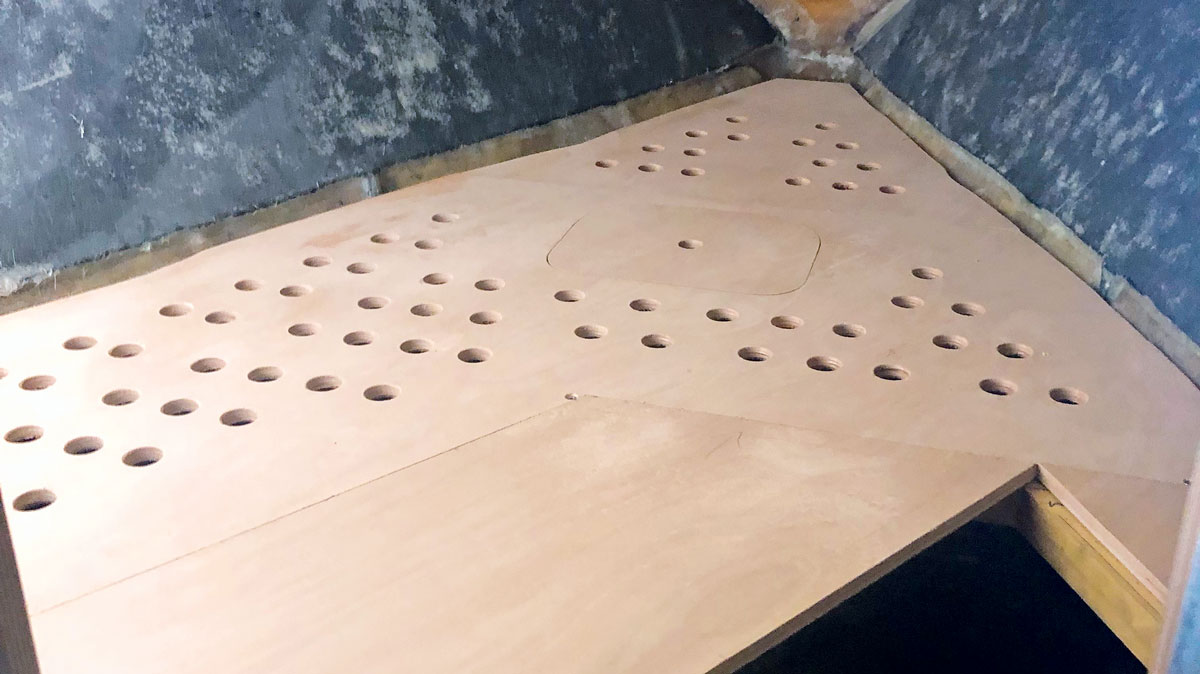A double boat bunk made out of wood