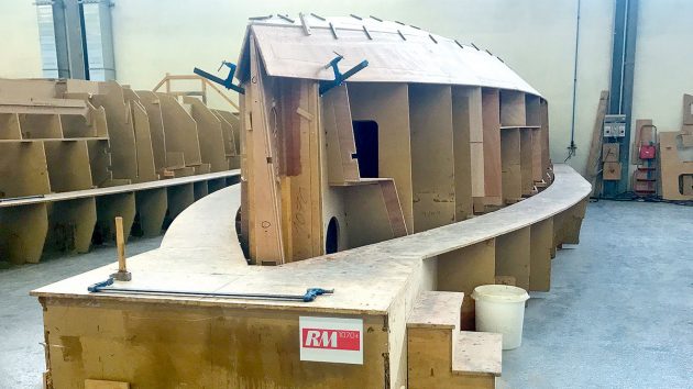 Plywood boats half way through construction