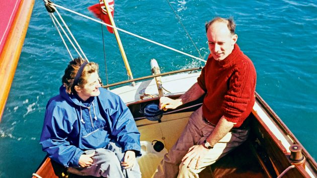 A couple sailing a shearwater boat