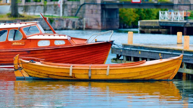 A wooden boat floating