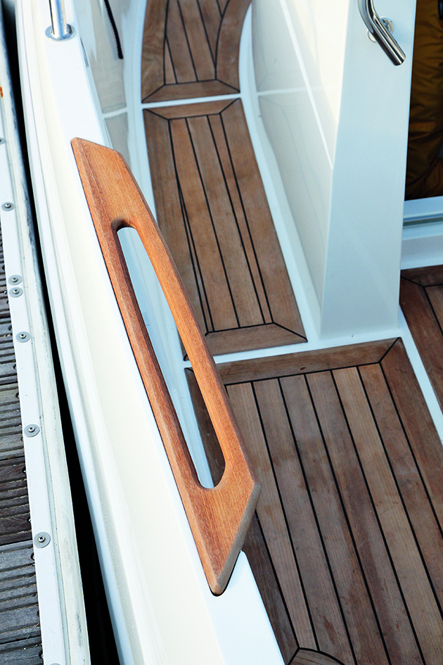 Teak handrail on a boat