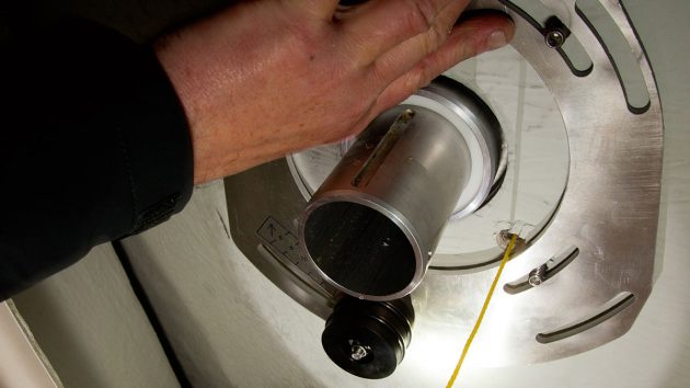 A stop ring being fitted during tiller to wheel conversion on a boat