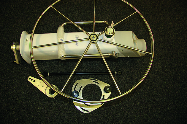 A tiller to wheel conversion kit for a boat