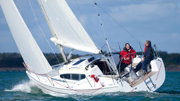 Two men sailing a Dehler 32 yacht