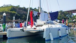 Washing handing up on a catamaran boat