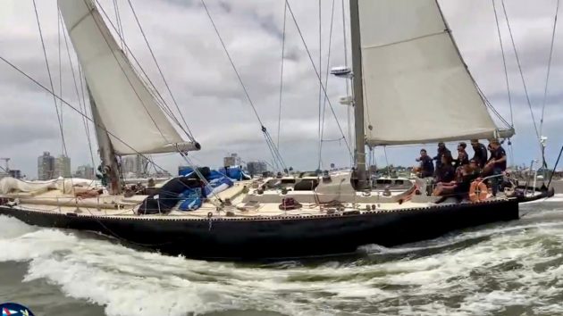 Marie Tabarly and the crew of Pen Duick VI cross the finish line