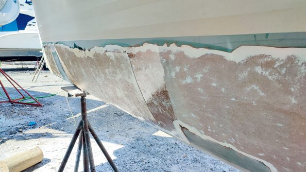 Chopped Strand Mat (CSM) laid up on a boat's hull during boat fibreglass repair