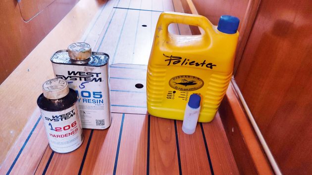 Bottles of epoxy on a boat