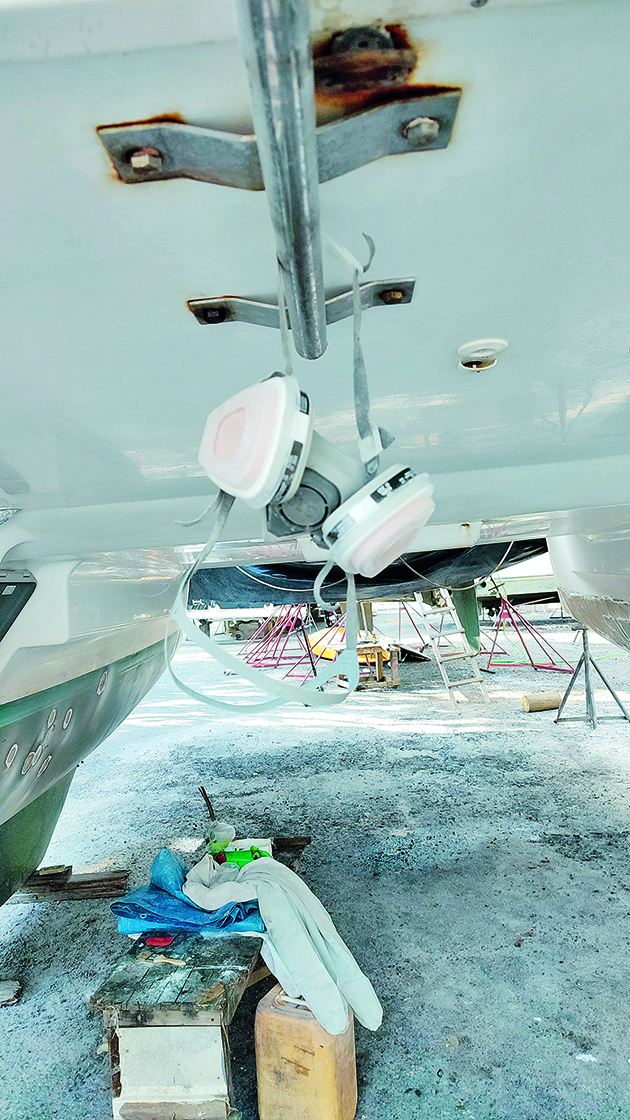 A respirator hanging from a boat during boat fibreglass repair