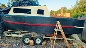 A part-built boat on a trailer