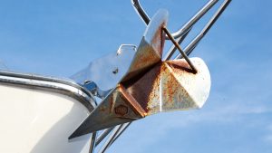 A rusty anchor on a boat