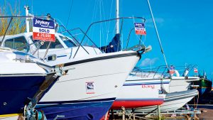 A boat with for sale signs