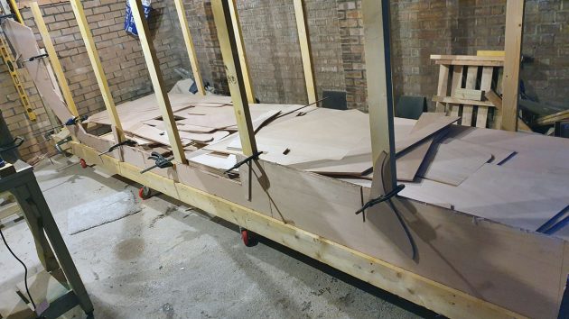 frames of a boat being built