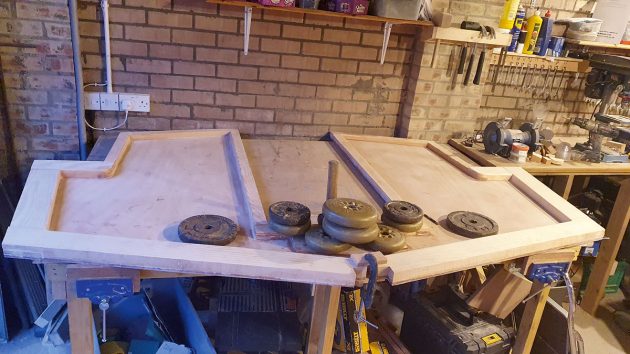 Weights on part of a motorboat during the building process