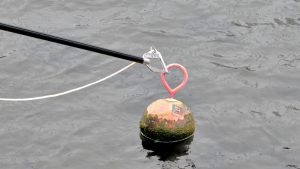 A Buoycatcher-Max being used to pick up a buoy