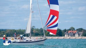 A boat sailing with a cruising chute