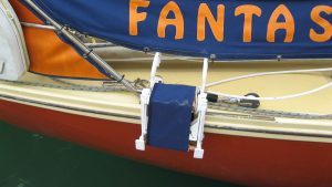 A ladder folded up on a boat