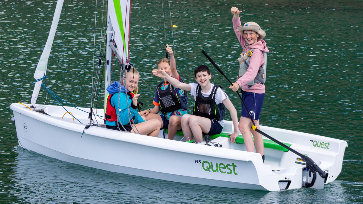 children in a boat at a sailing club. Funding the Future competition aims to nurture sailing clubs