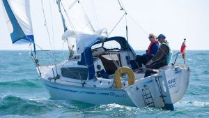 A yacht sailing to windward