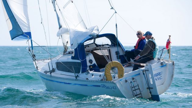 A yacht sailing to windward