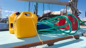 spare diesel in jerry cans on a boat