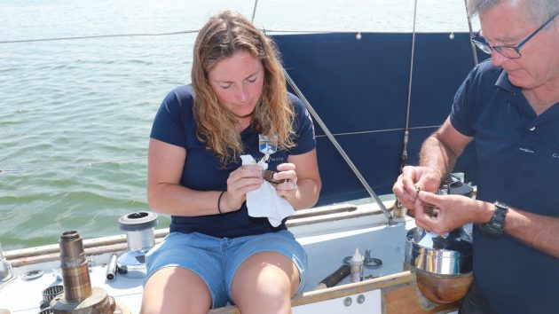 a woman maintaining a winch