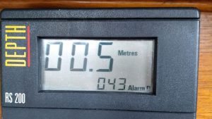 a depth transducer showing the water under the keel of a boat