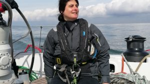 A woman wearing a Zhik CST500™ Coastal Sailing Smock