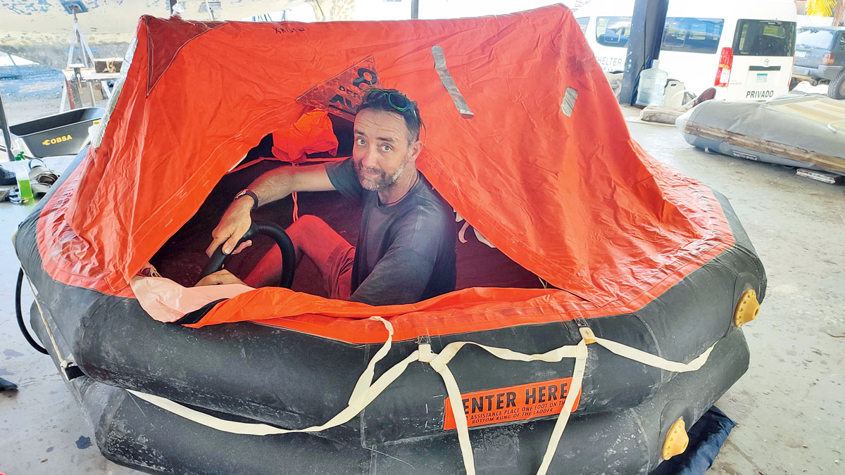 A man sitting in a liferaft