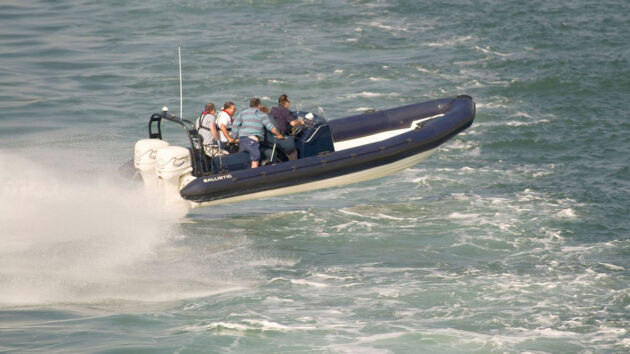Rigid inflatable boat travelling at speed. Photo credit: Alvey & Towers Picture Library/Alamy