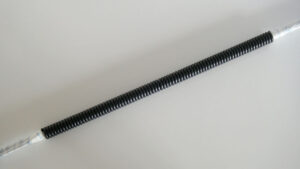 Curly cord being made