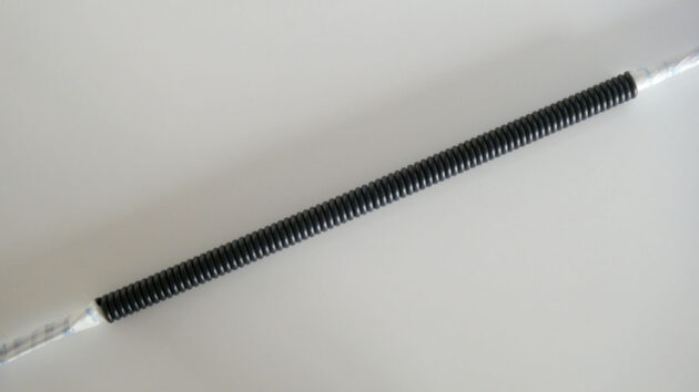 Curly cord being made