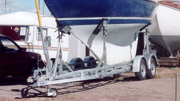 A yacht on a used boat trailer