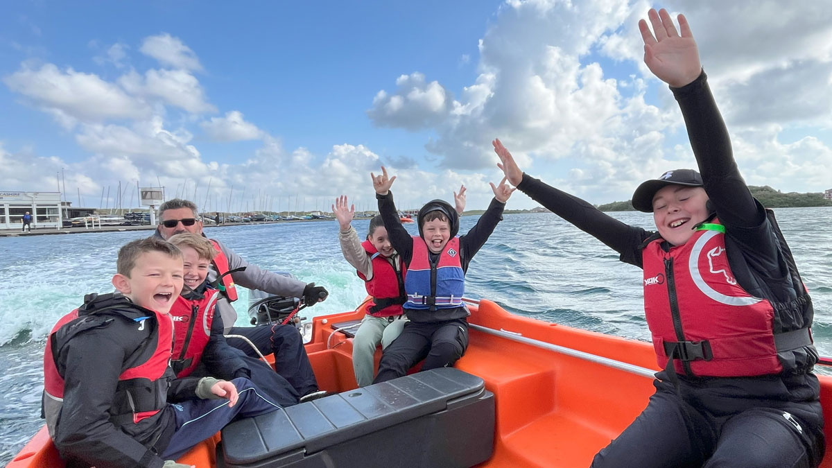 Year 5 pupils from Norwood Primary School in Southport try sailing on the Marine Lake thanks to West Lancashire Yacht Club