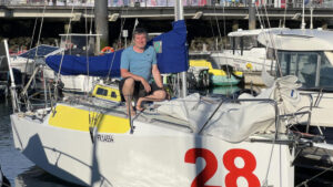 Renaud Stitelmann sitting on the deck of his boat