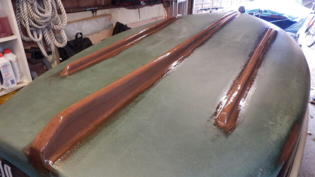 A boat with new keel band and painted in Coppercoat antifouling