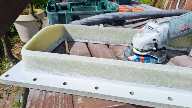 Fibreglass being built up on a boat