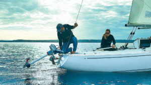 A person using an electric engine on a boat