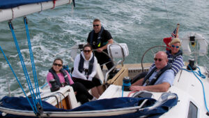 New sailors on a boat sailing at sea