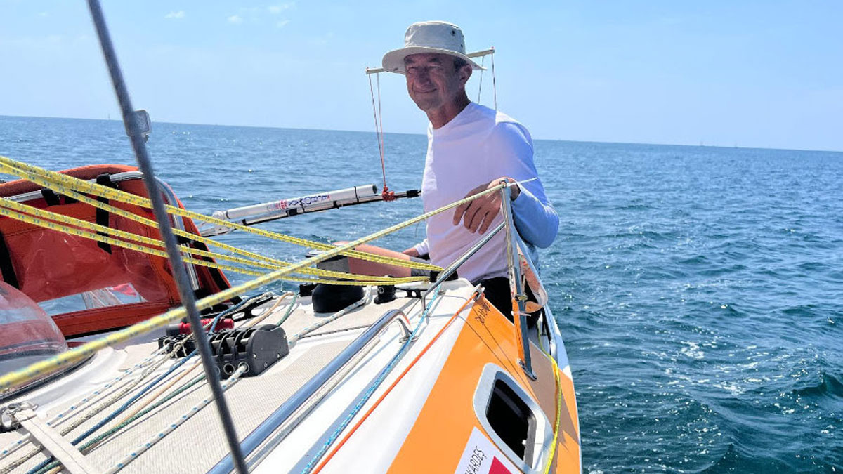 Ertan Beskardes on the deck of his Glone 5.80 yacht
