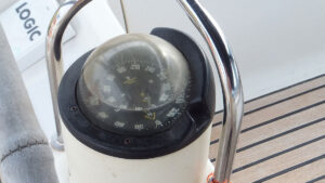 A liquid filled compass on a boat