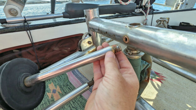 A woman servicing a wind vane system