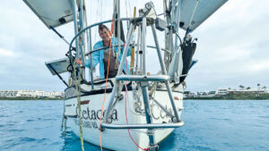 A Monitor wind vane self-steering system on the back of a boat