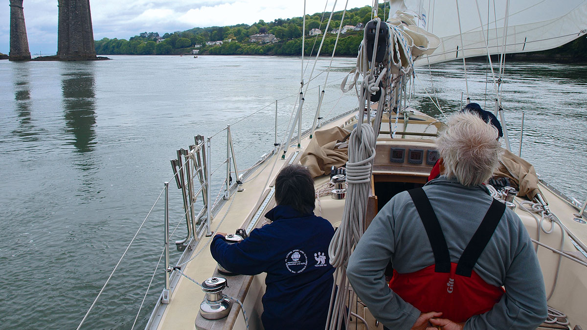 People sailing through the Swellies in Wales while sailing around the UK