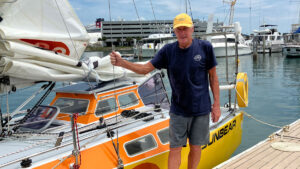 Eric Marsh standing by his boat