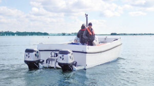People standing up in an eBoat cat