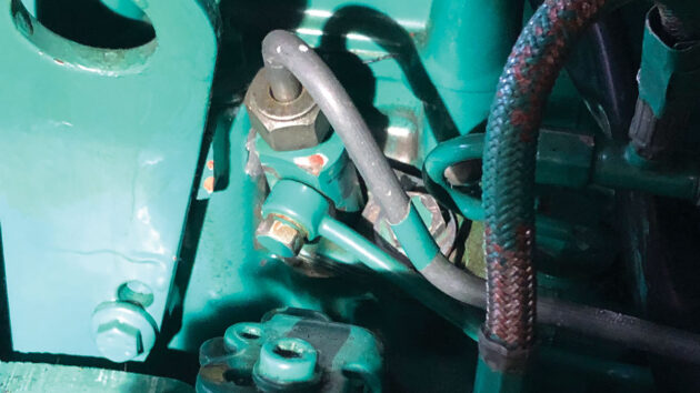 An injector delivery pipe on a boat engine