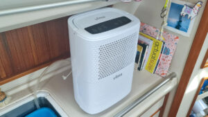 A dehumidifier being used on a boat